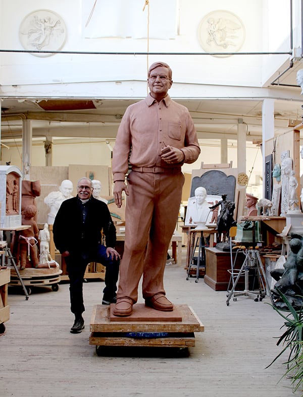 David Mugar clay and Bob IMG_8476 small file clay model of statue of man in sculpture studio with sculptor Robert Shure