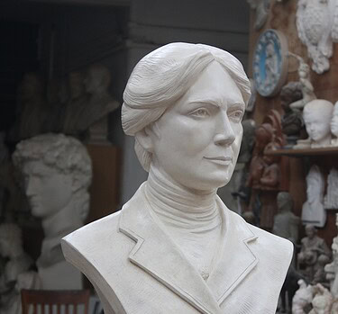 detail of white plaster bust of female, namely Alice Hamilton, in an art studio